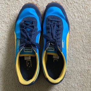 Used- like new blue & yellow men’s Pumas size 10.5